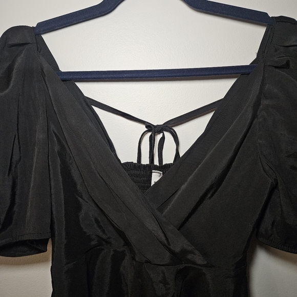 Cute Black Peplum Top With Puff Sleeves - Picture 2 of 7